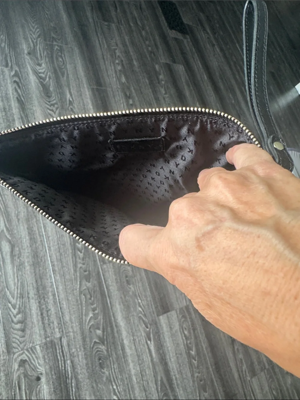 DKNY Black Leather Wristlet Pouch with Gold Logo NWOT